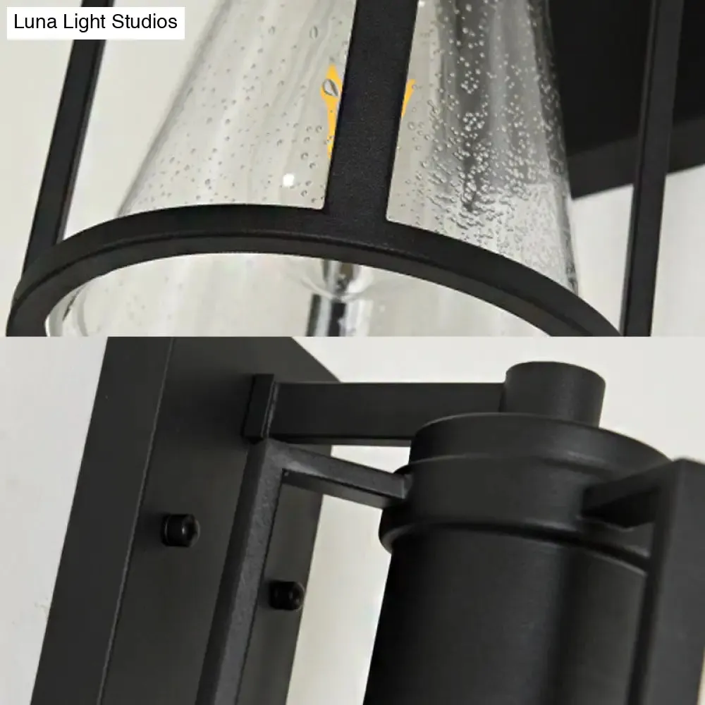 Industrial Black Sconce with Seeded Glass and Metal Cage